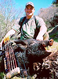 Mike Wall with a 200+ pound Wild Boar